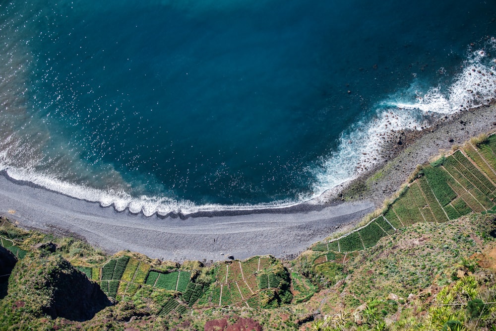 an aerial view of a beach and a body of water