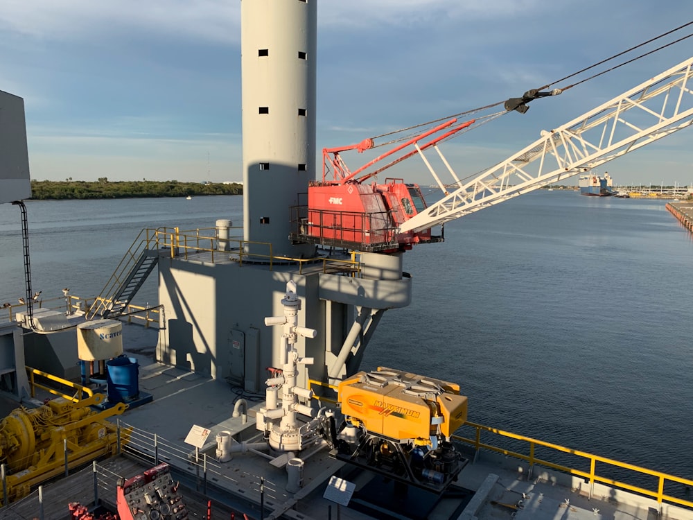 a crane is on the deck of a ship