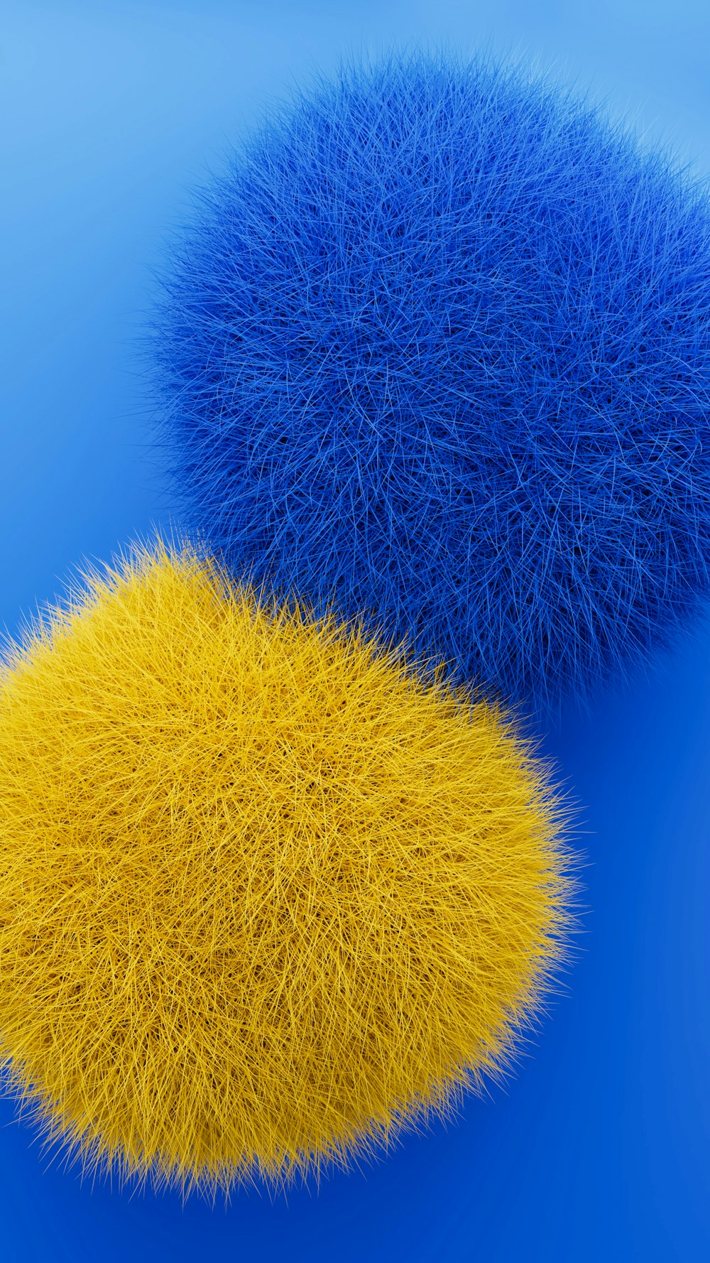 two blue and yellow balls on a blue background