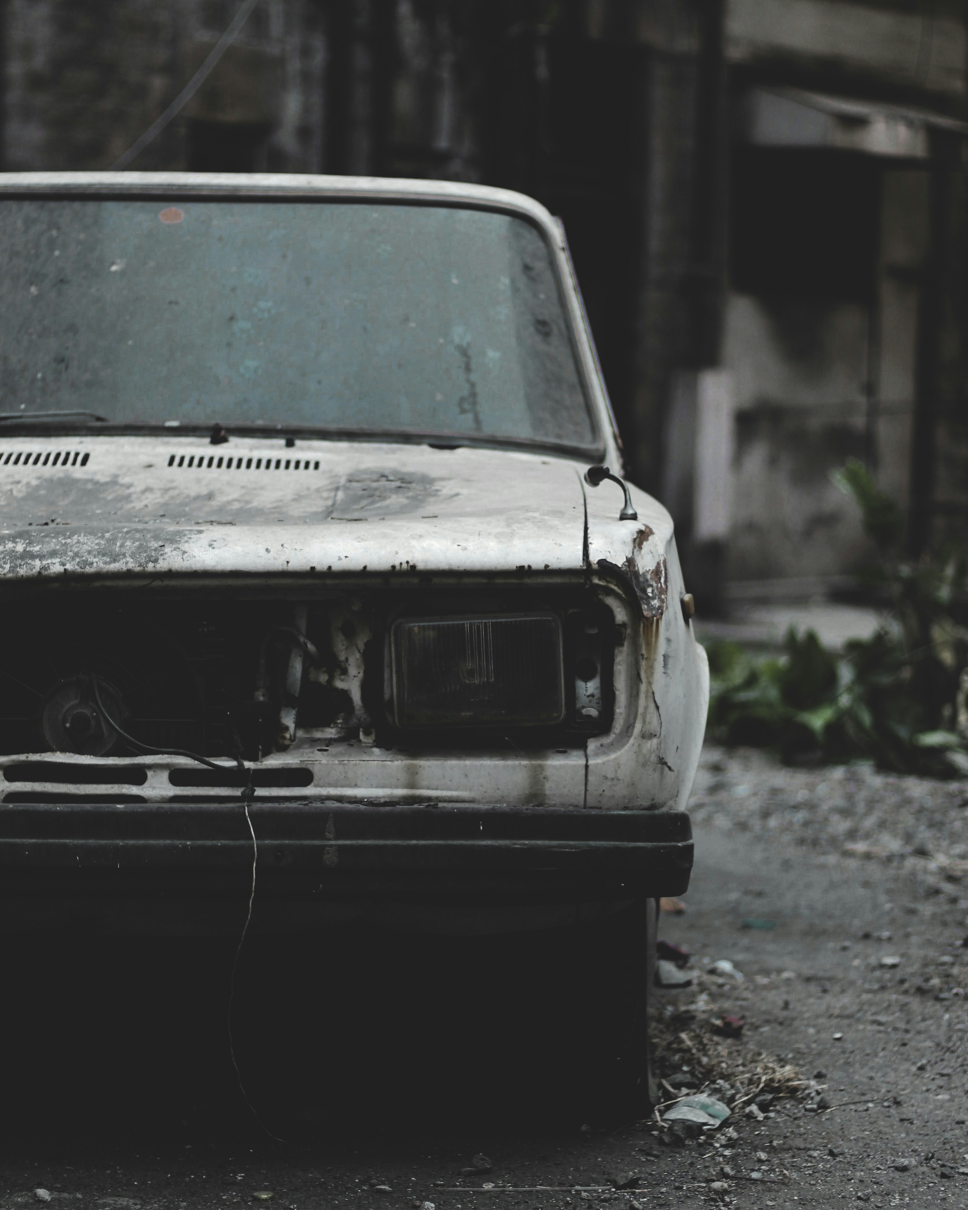 a car that is sitting in the dirt