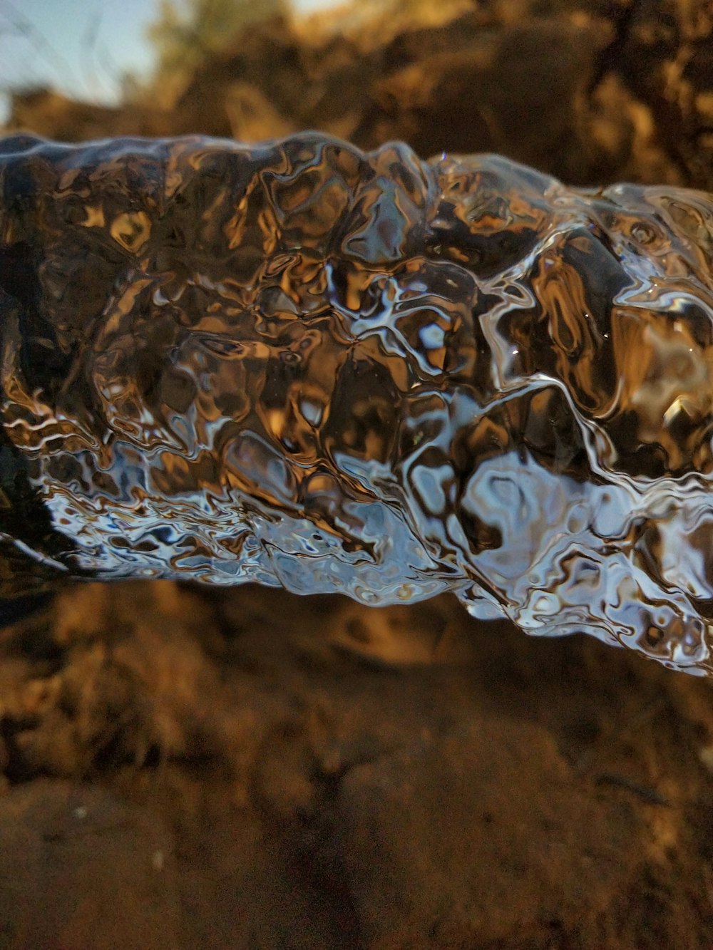a close up of a rock with water on it