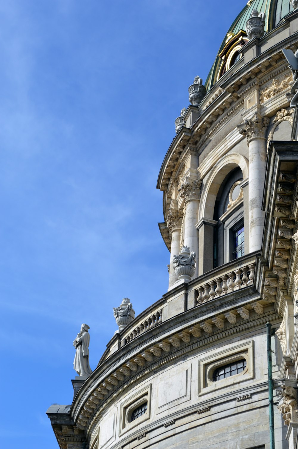 a large building with a clock on the front of it