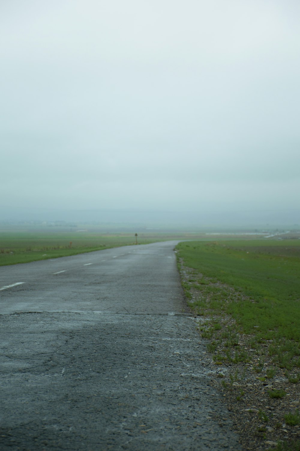 an empty road in the middle of nowhere