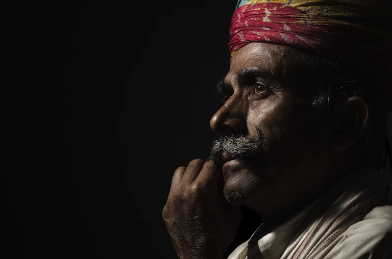 Indian man wearing a turban with quiet confidence