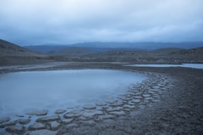 A barren landscape affected by water depletion from data operations.