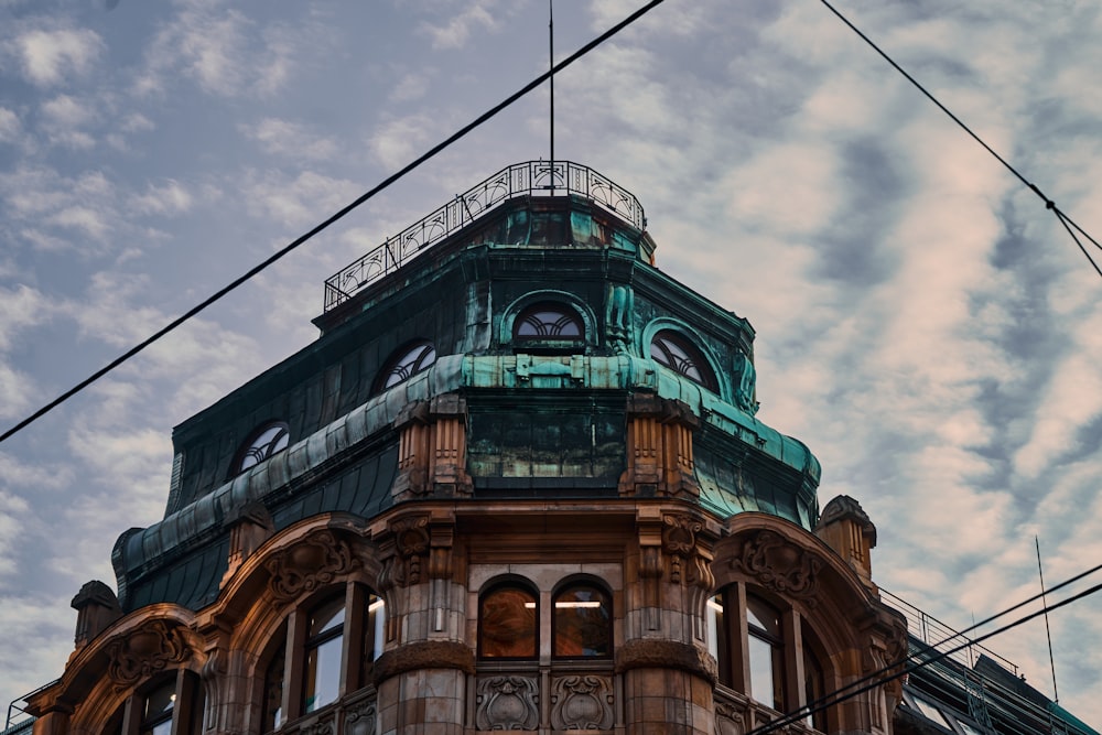 a tall building with a clock on the top of it