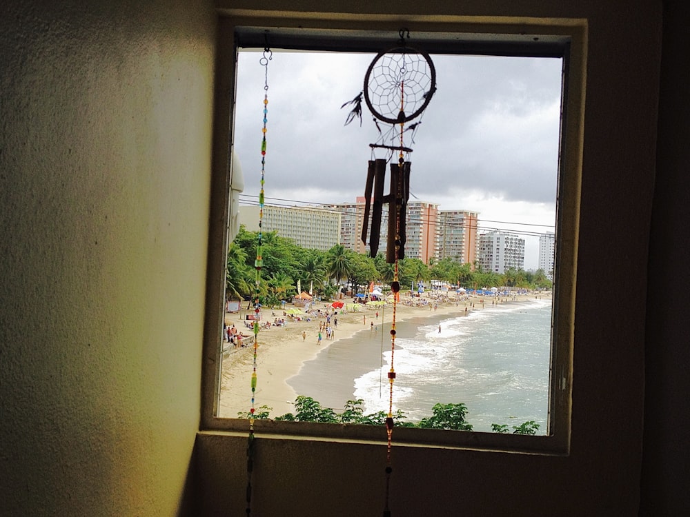 a view of a beach from a window