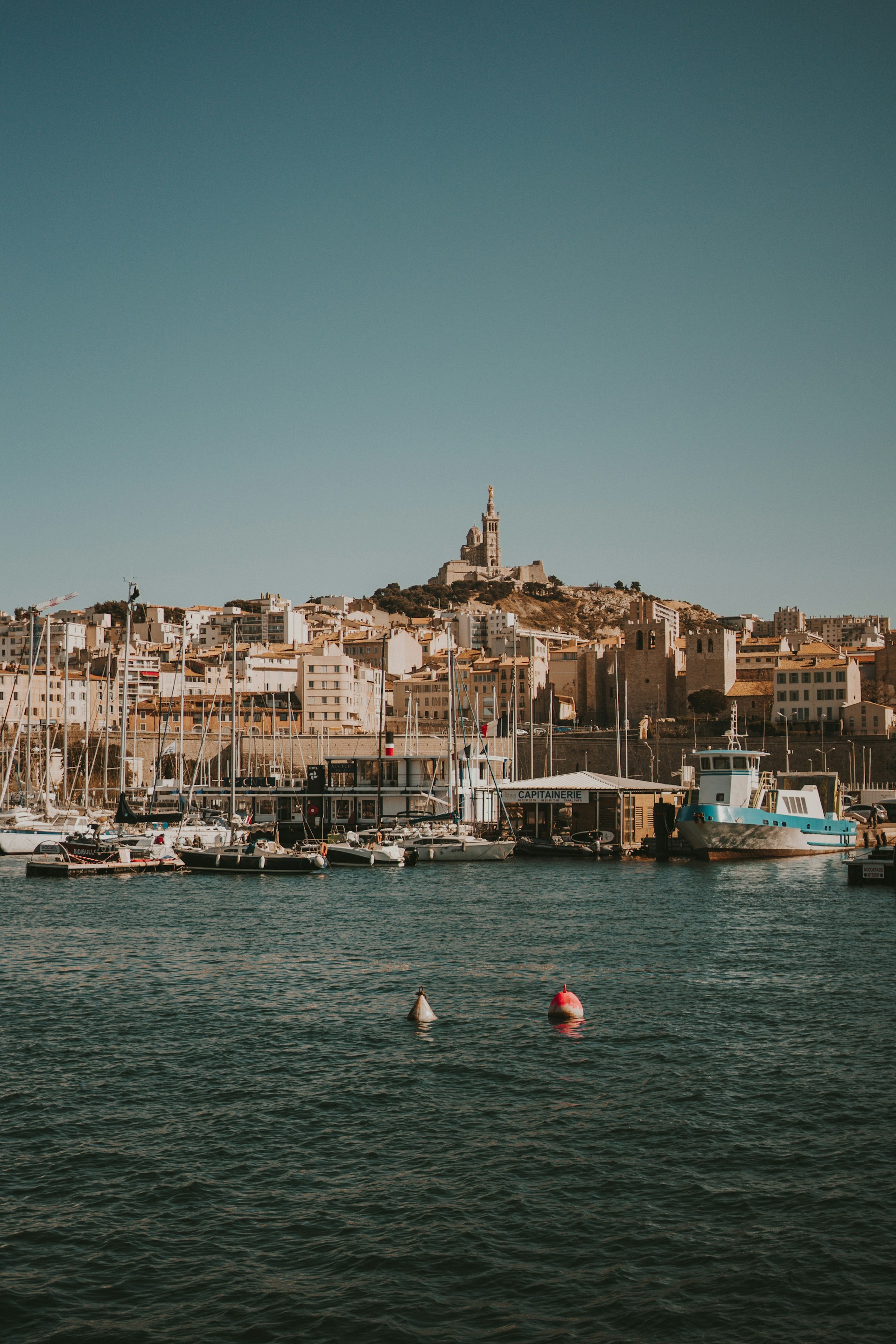 a body of water with a bunch of boats in it