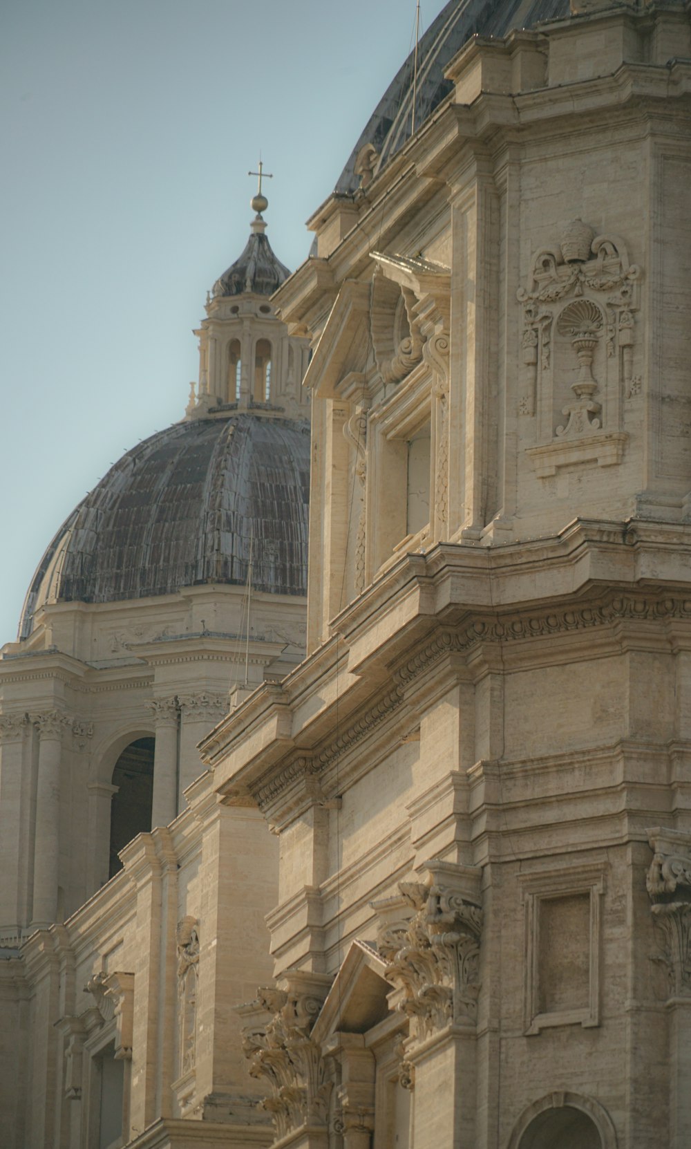 a large building with a clock on the front of it