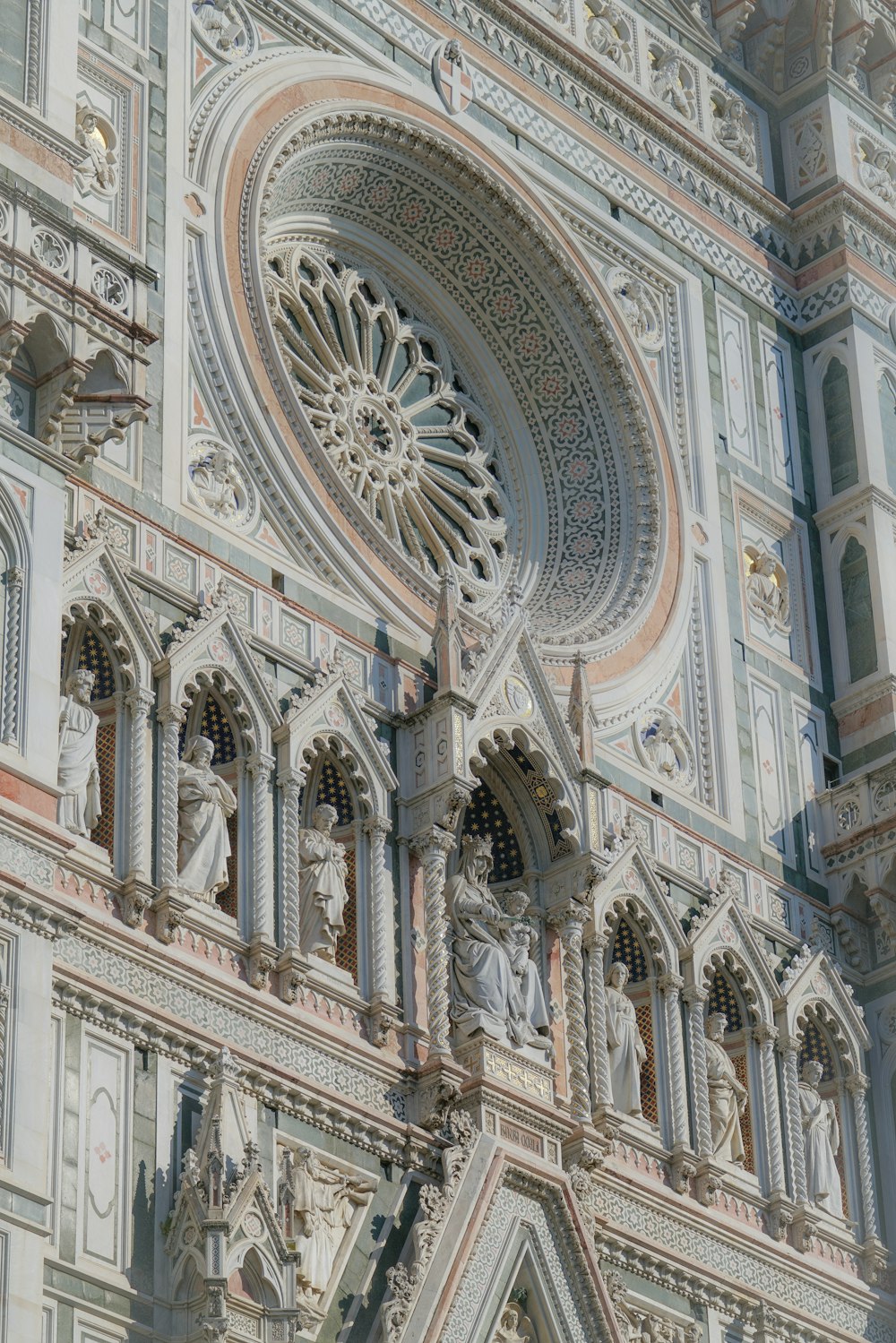 a large ornate building with a clock on it's side