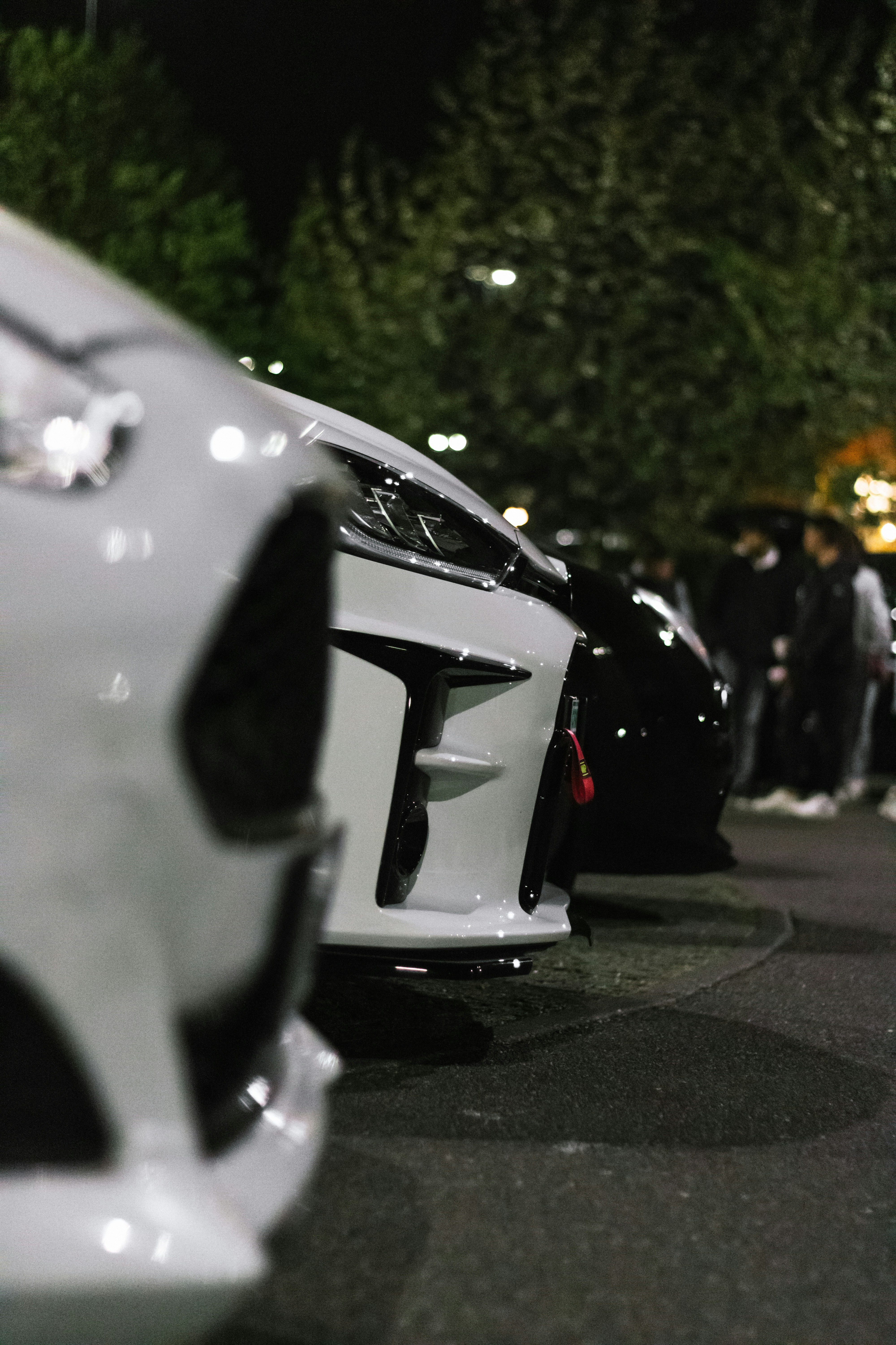 A row of parked cars sitting next to each other photo – Free Car Image ...