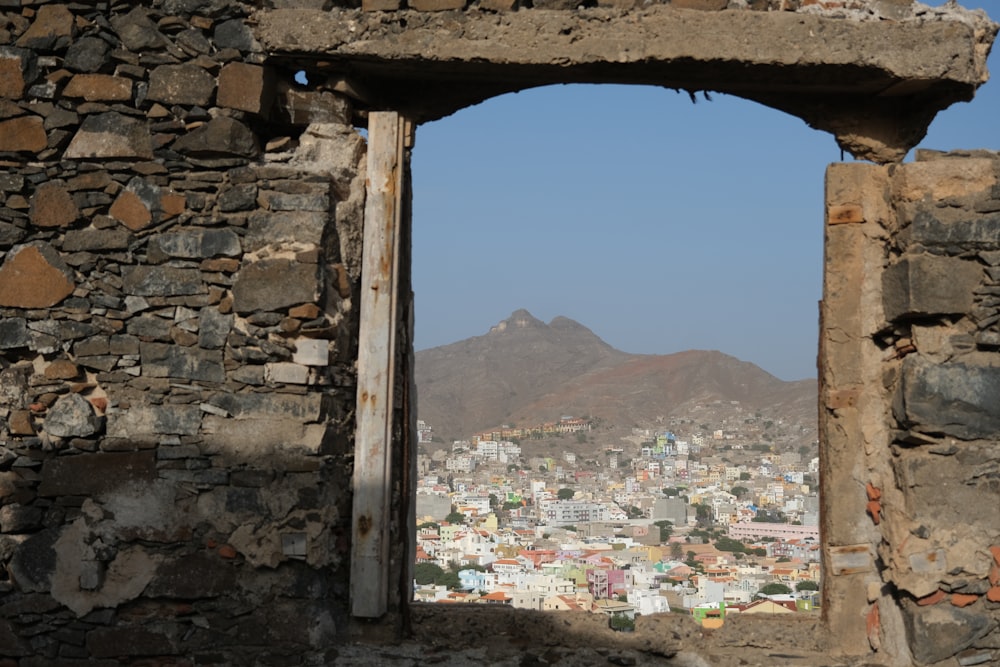 a view of a city through an old window