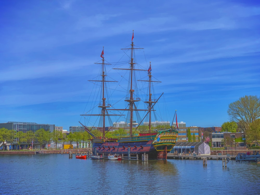 a large boat floating on top of a body of water