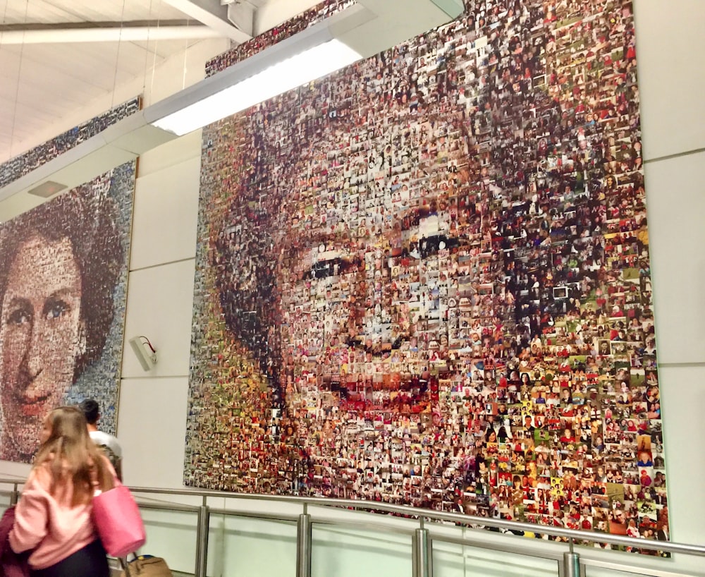 a large portrait of a woman on a wall