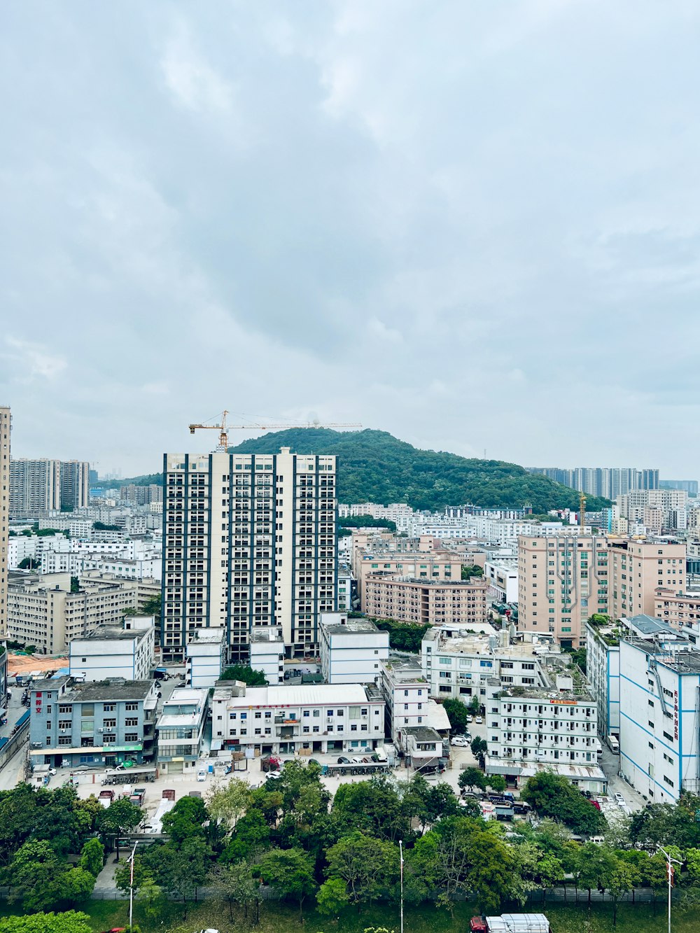 a view of a city with tall buildings