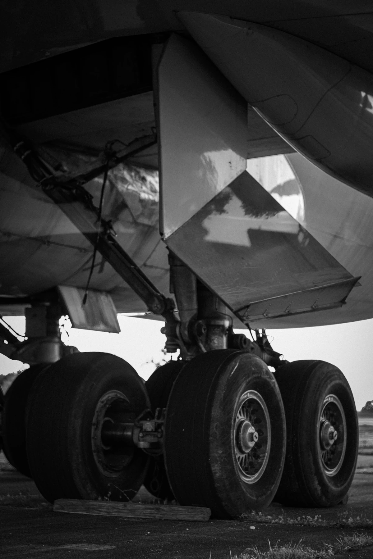 Close-up of an airplane landing gear and wheel, representing certified rotable inventory