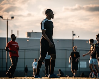 a group of young men playing a game of frisbee