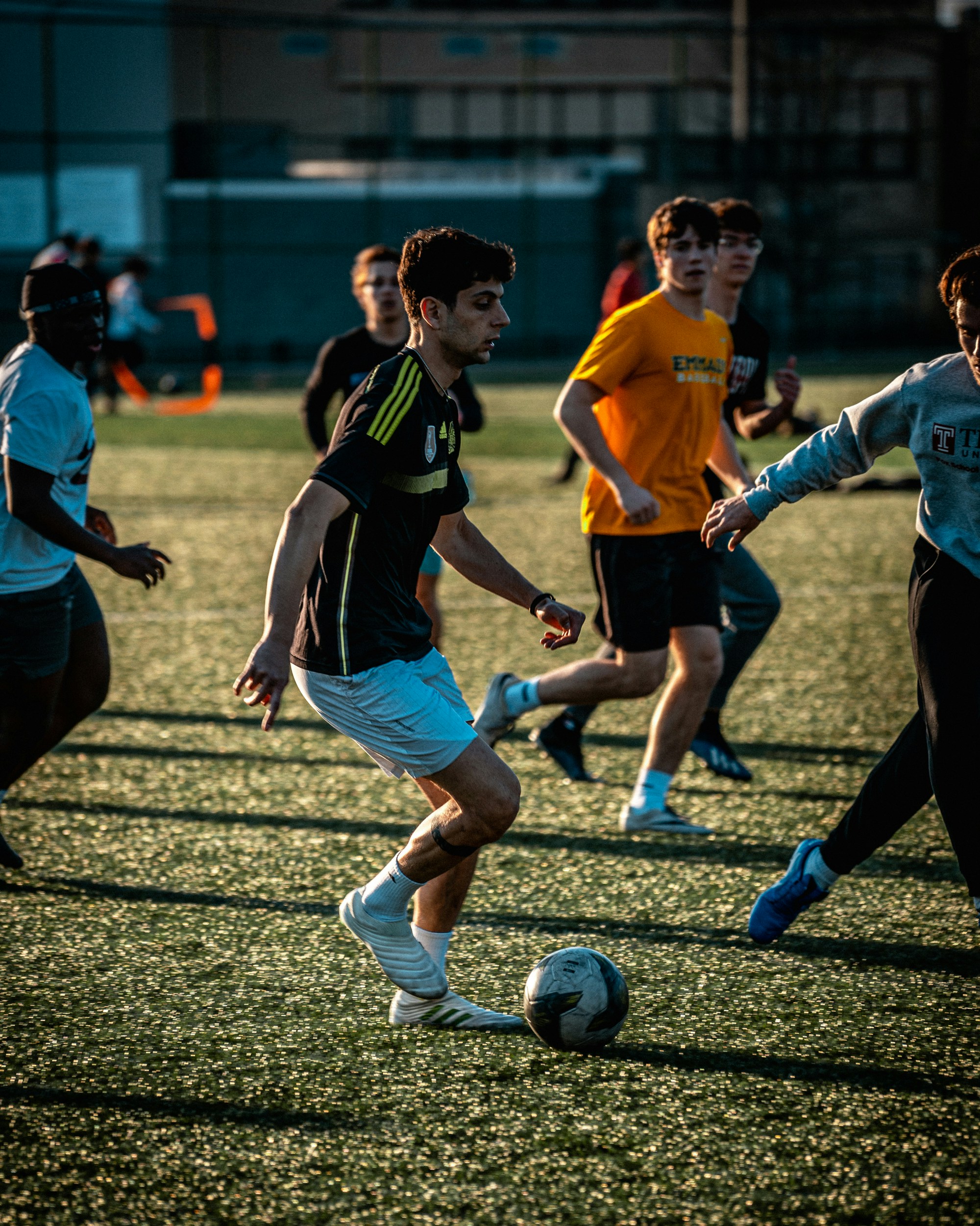 a group of young men playing a game of soccer