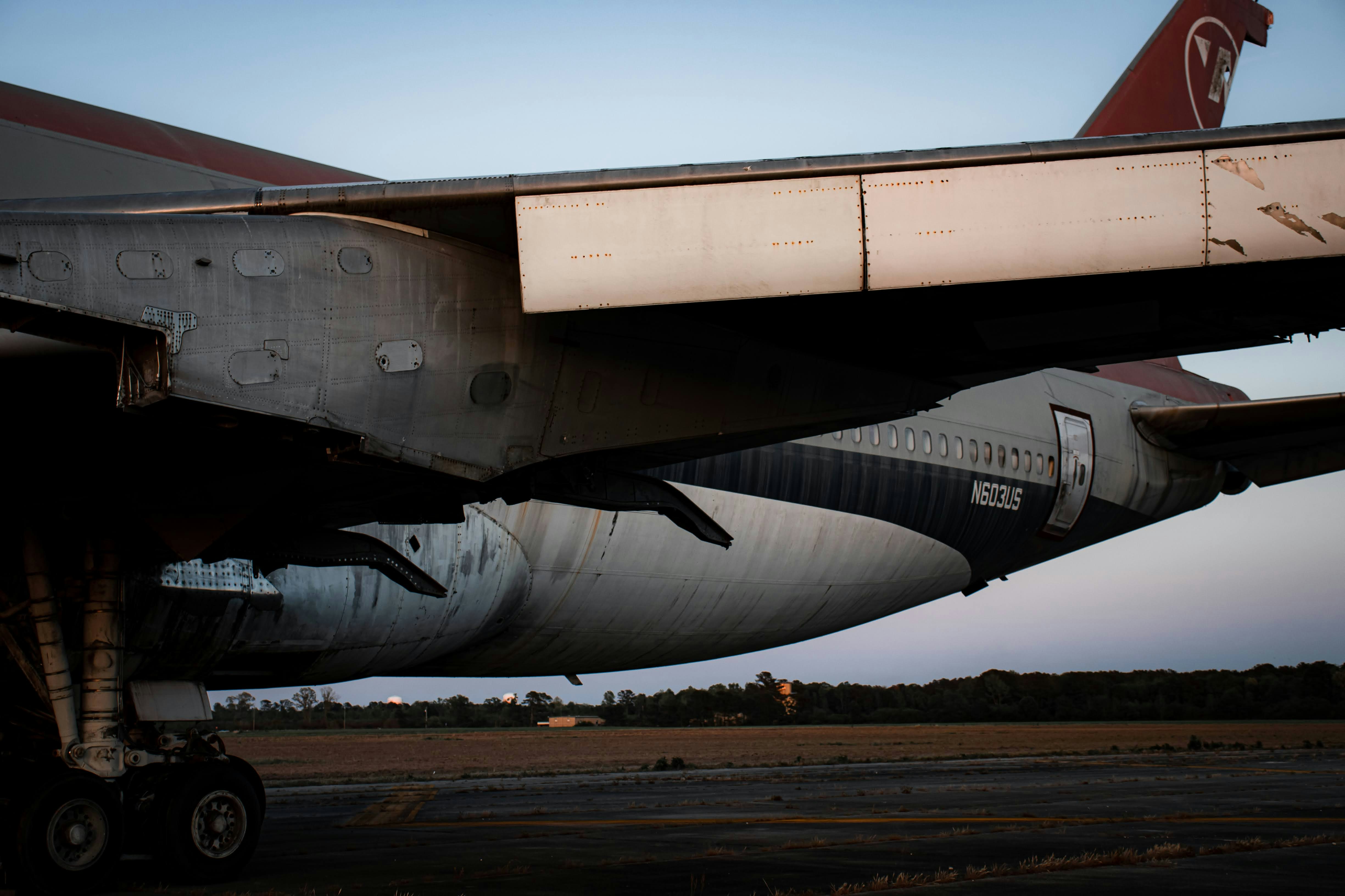 a large jetliner sitting on top of an airport tarmac