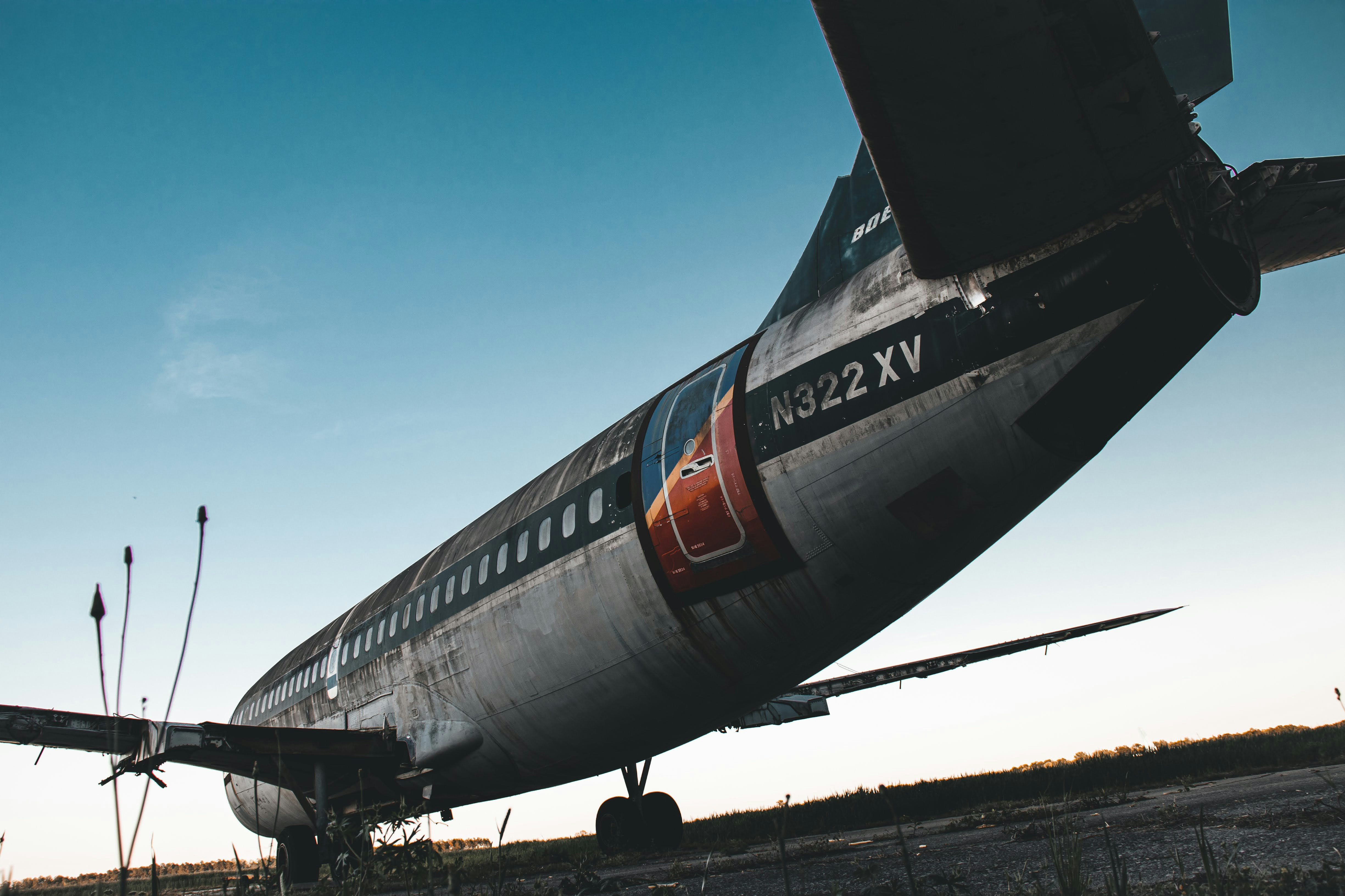 a large passenger jet sitting on top of an airport tarmac, 