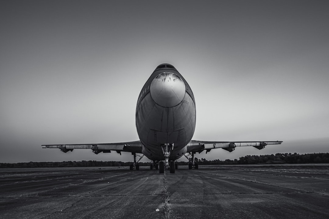 a large jetliner sitting on top of an airport tarmac