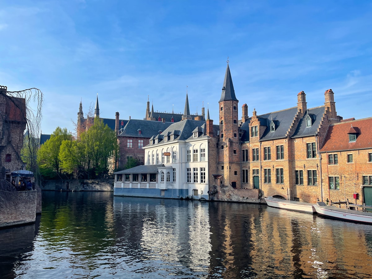 Bruges November — Christmas market opening on the Markt with belfry lit