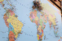 a map of the world with pins on it