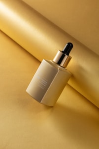 a bottle of liquid sitting on top of a table