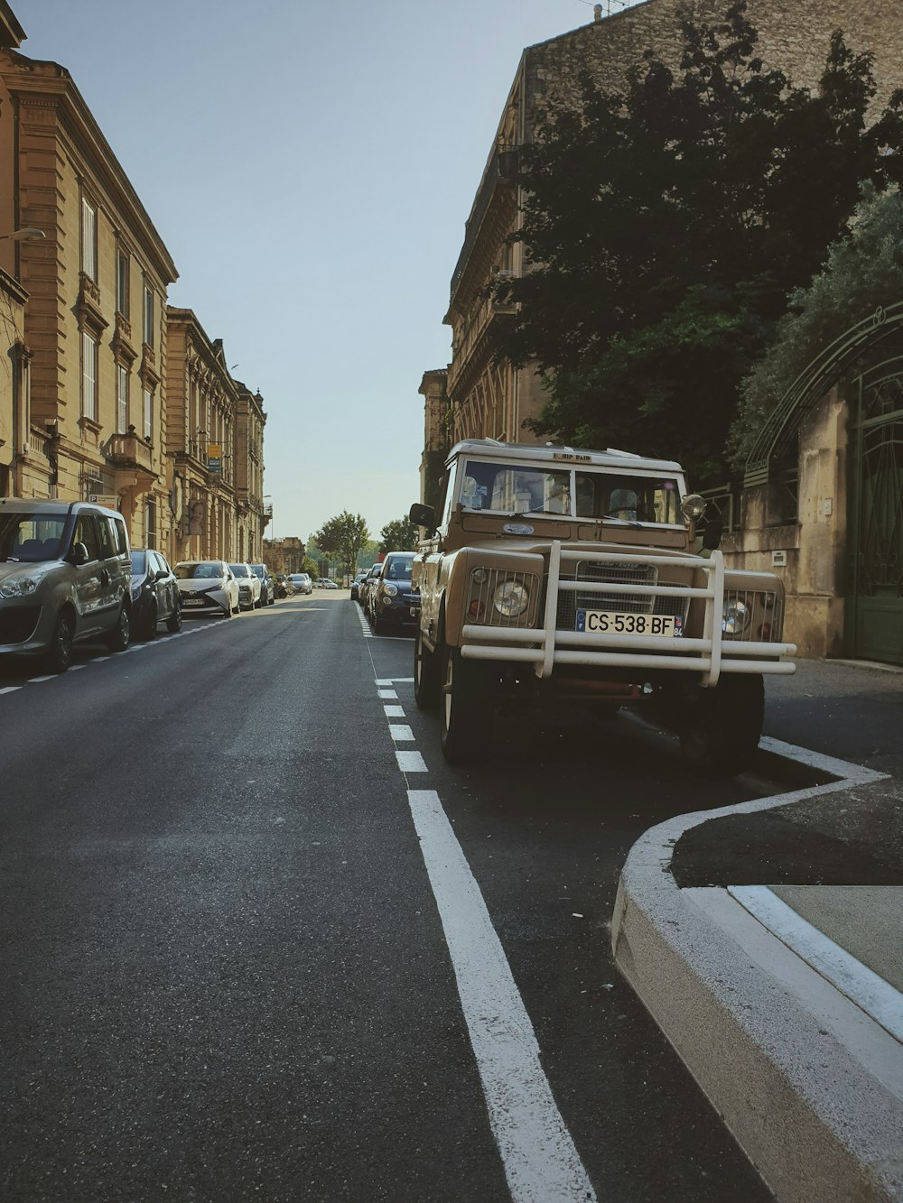 a truck is parked on the side of the road