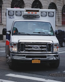an ambulance parked on the side of the road