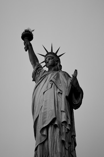 a black and white photo of the statue of liberty