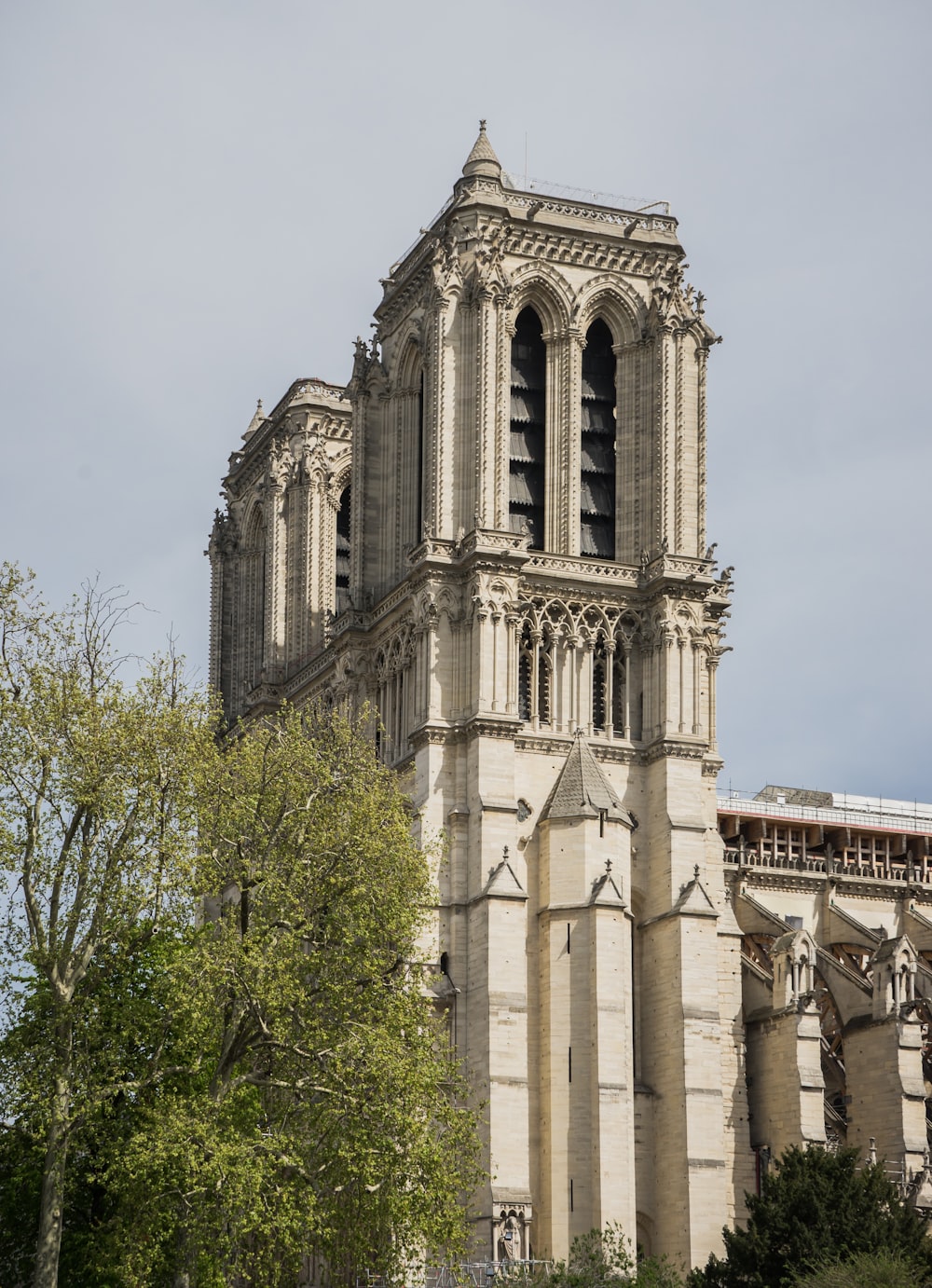 a very tall building with a clock on it's side