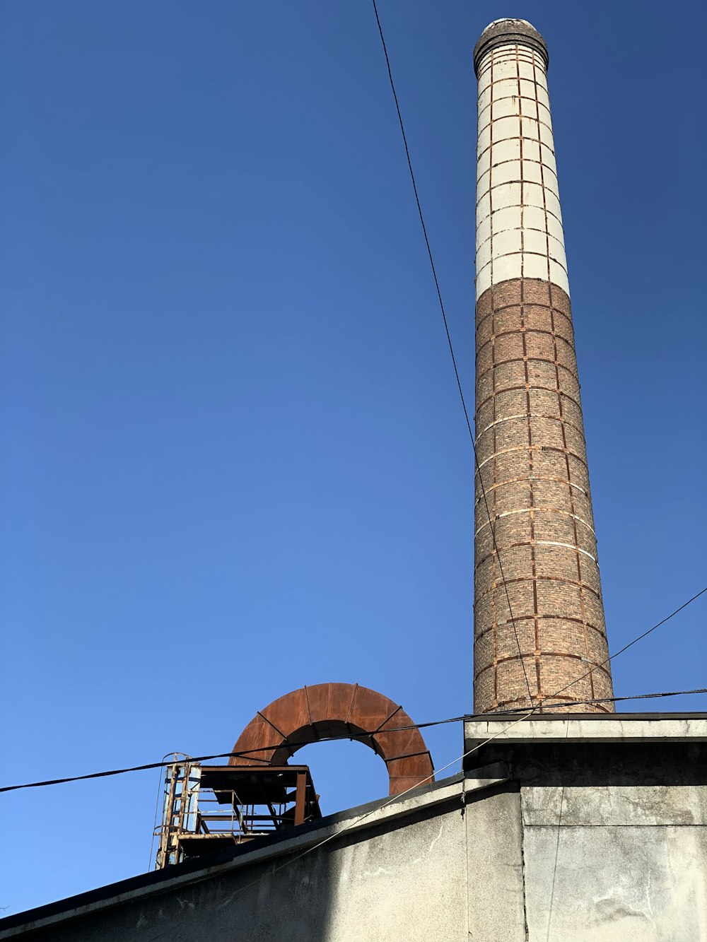 a brick chimney with a brick door on top of it