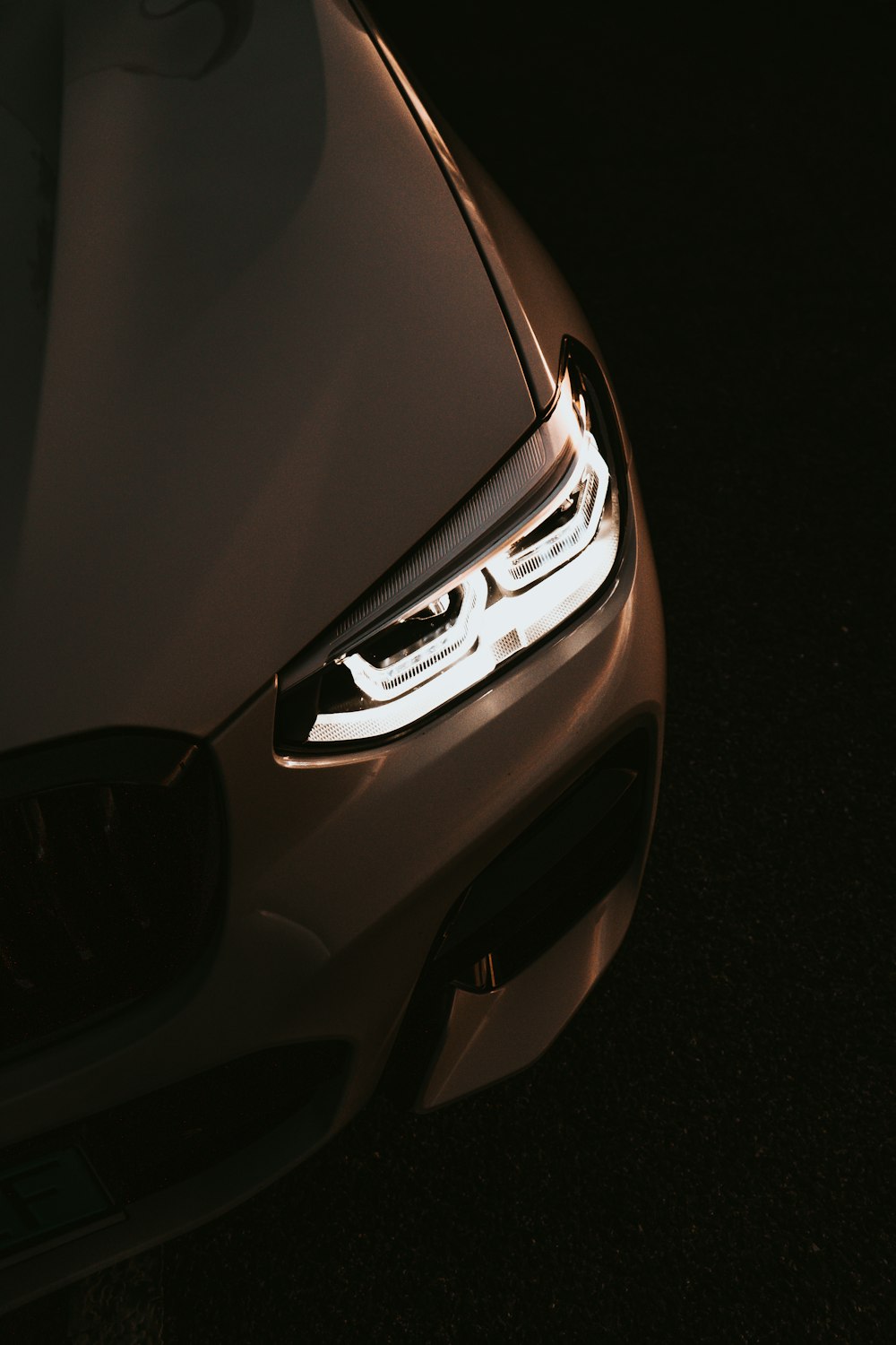 a close up of the headlights of a car