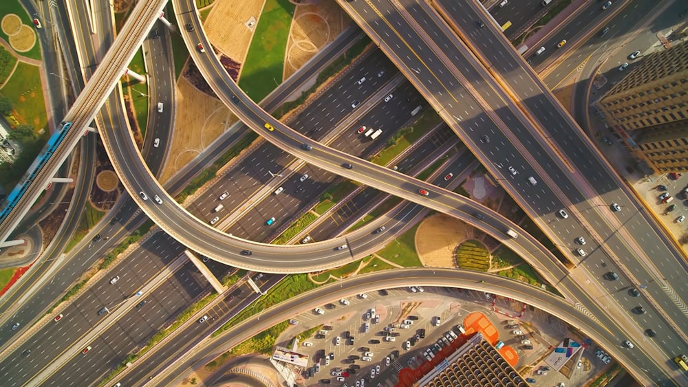 an aerial view of a highway intersection in a city