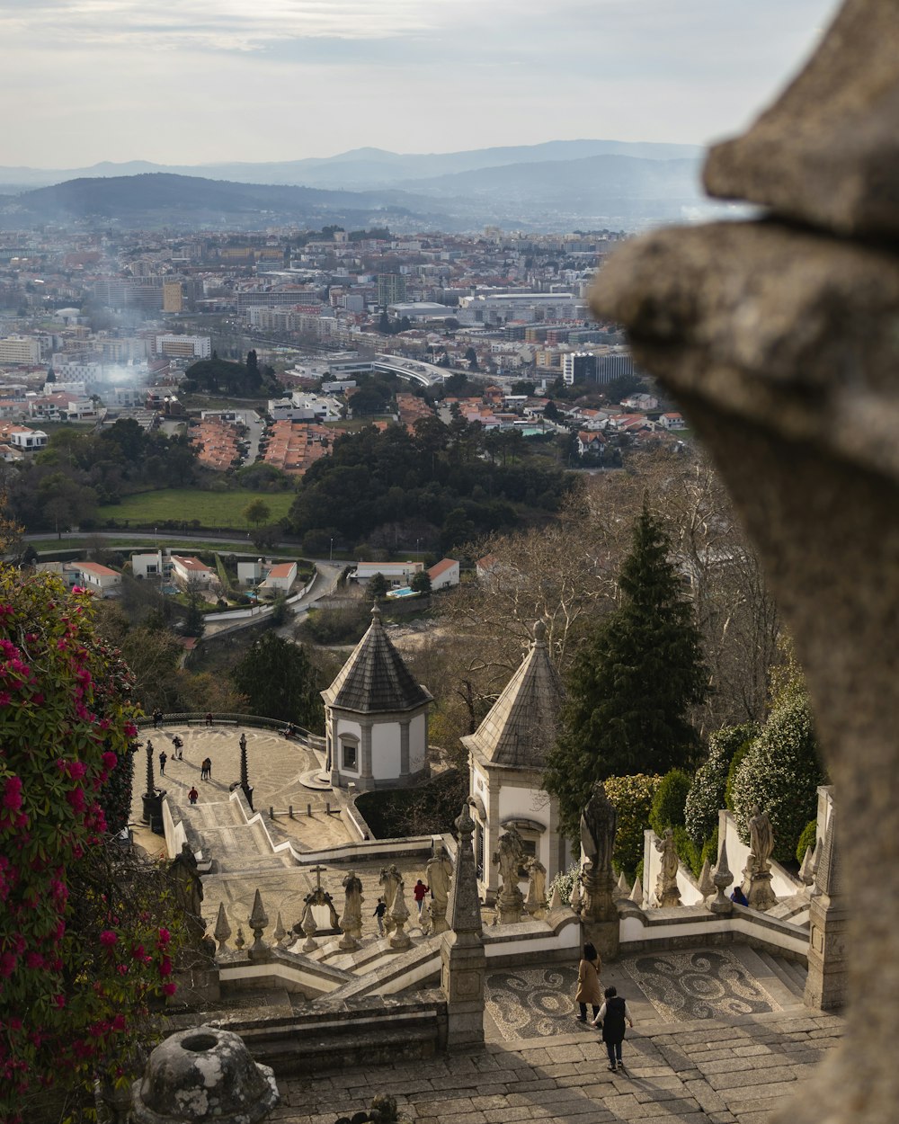 a view of a city from the top of a hill