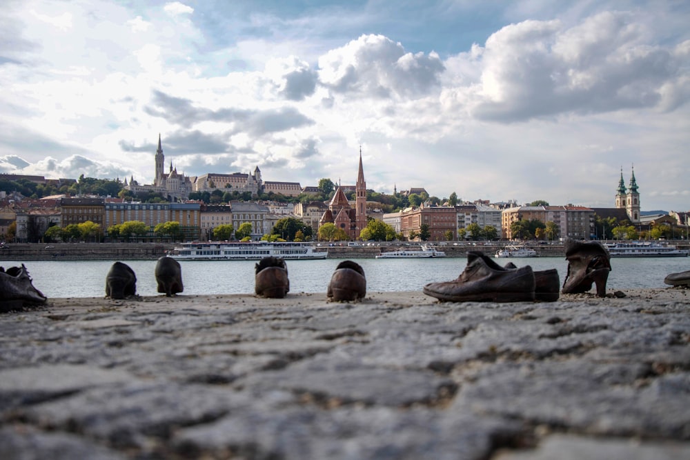 a group of shoes that are sitting on the ground