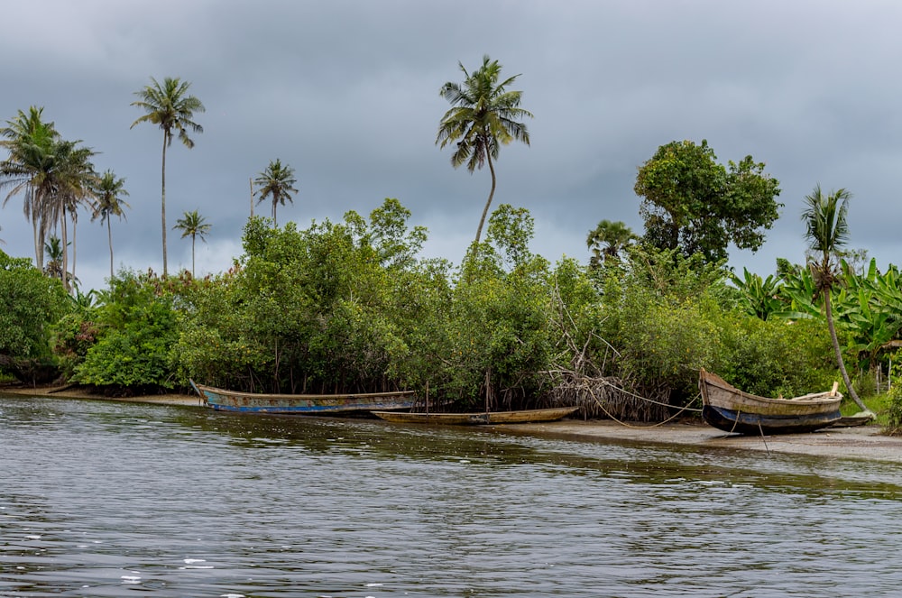 a couple of boats that are sitting in the water