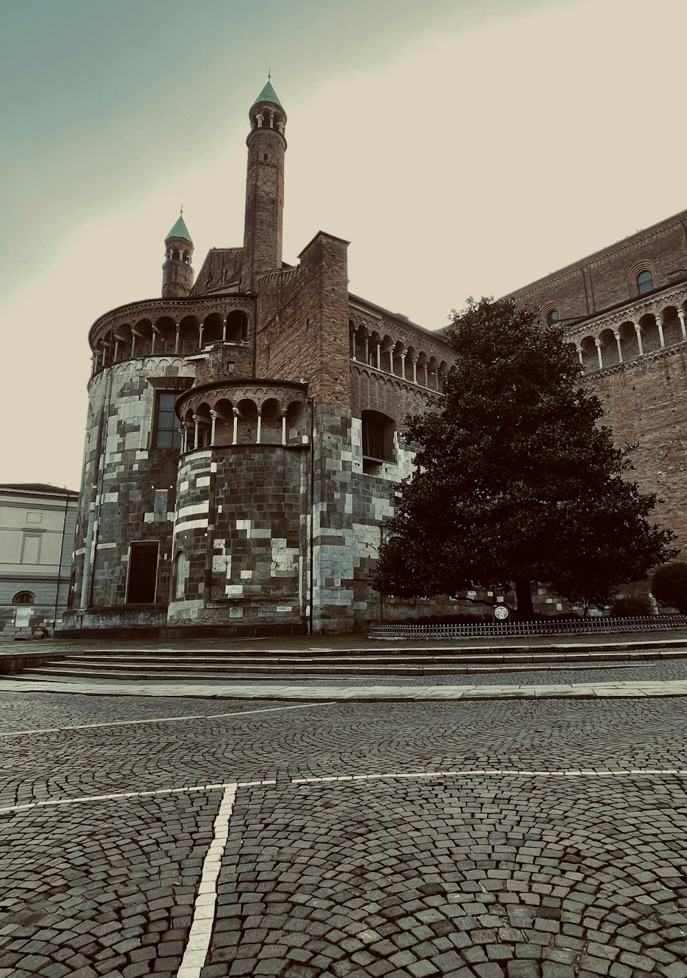 a large brick building with a clock tower