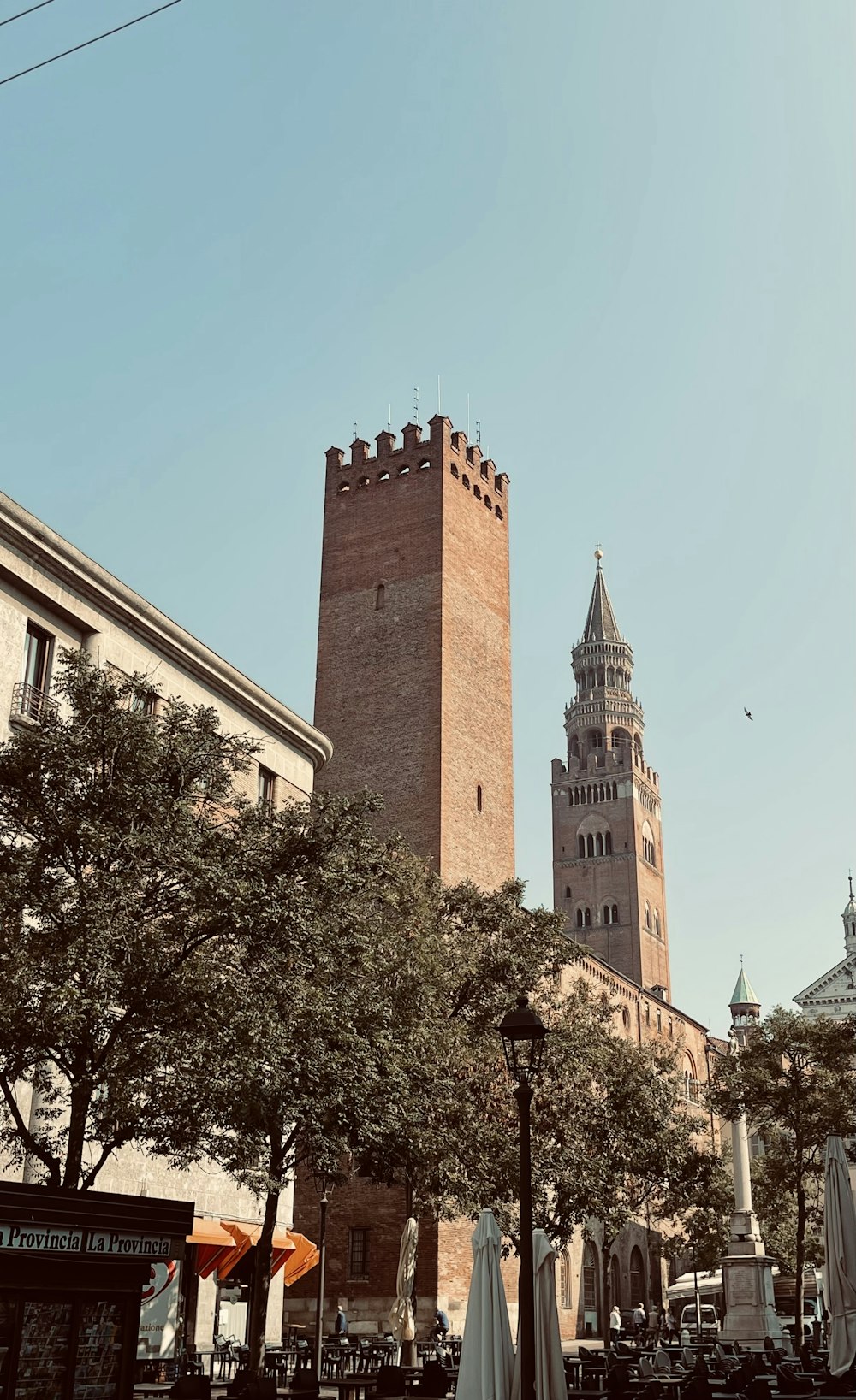 a tall tower with a clock on the top of it