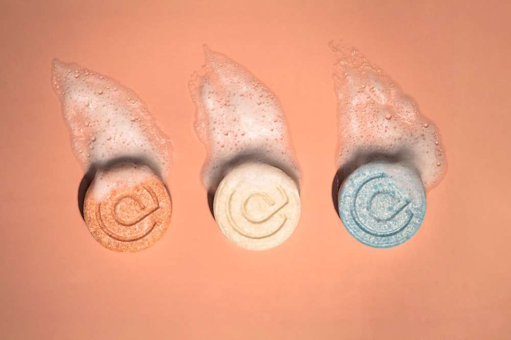 a group of three bath bombs sitting next to each other