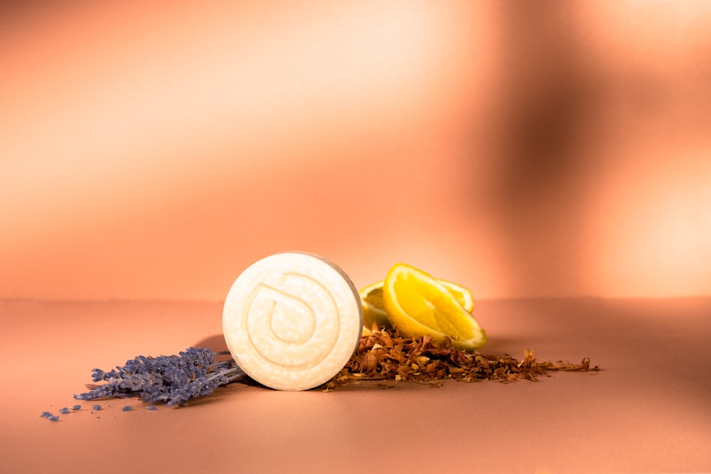 a close up of a soap and a pile of lavender