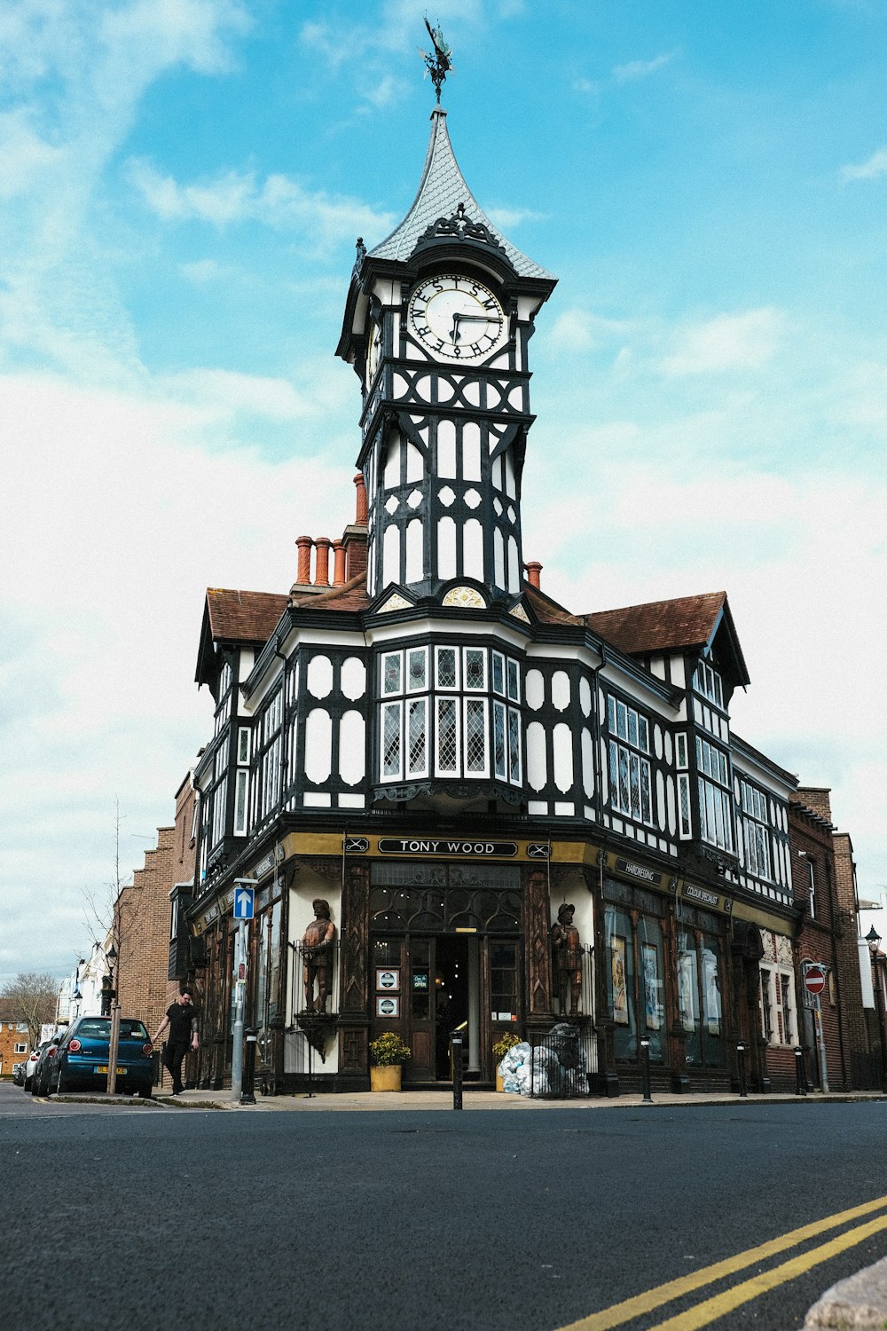 a tall building with a clock on the top of it