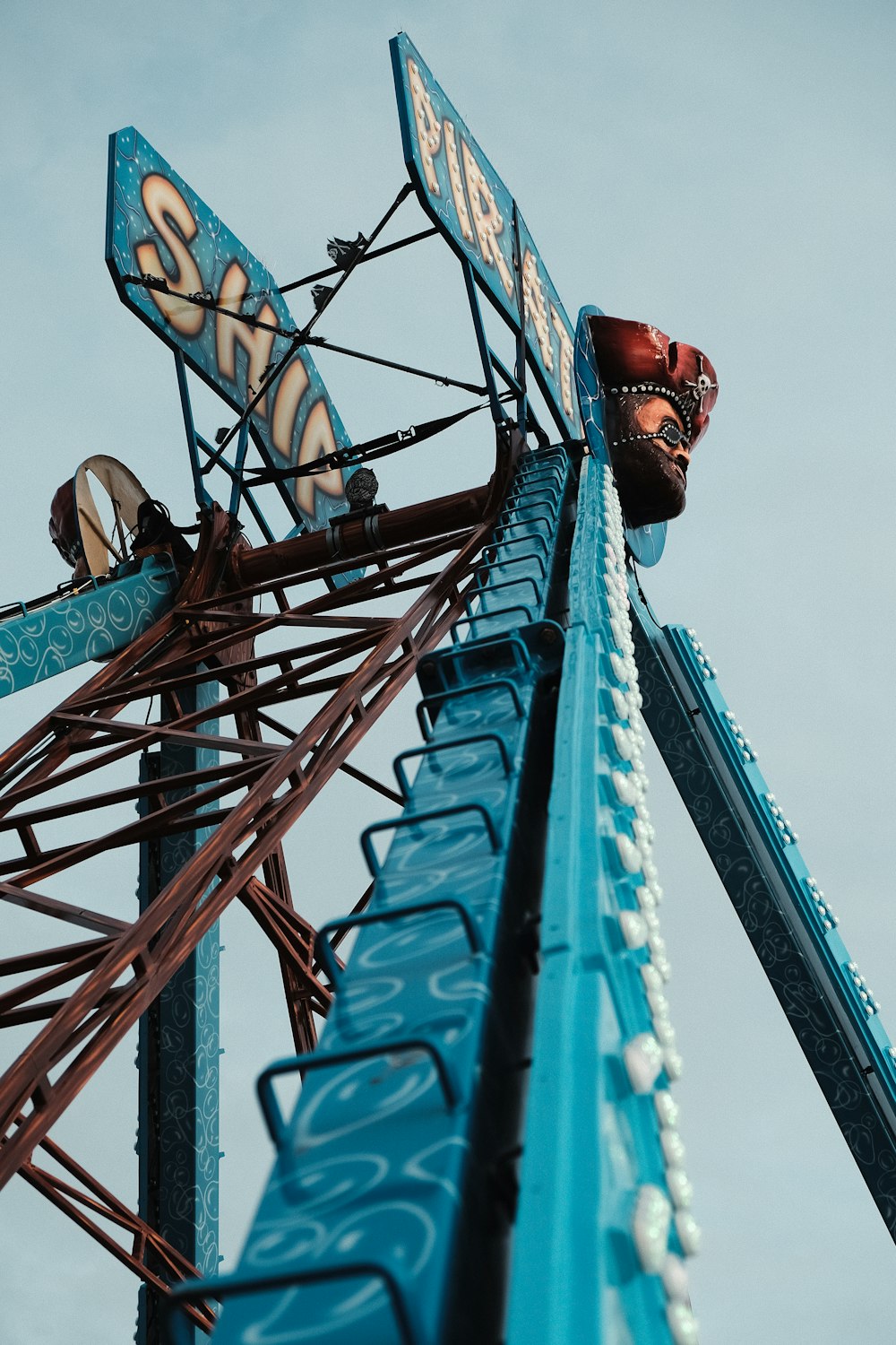 a close up of the top of a roller coaster