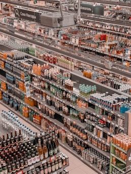 a grocery store filled with lots of bottles of beer