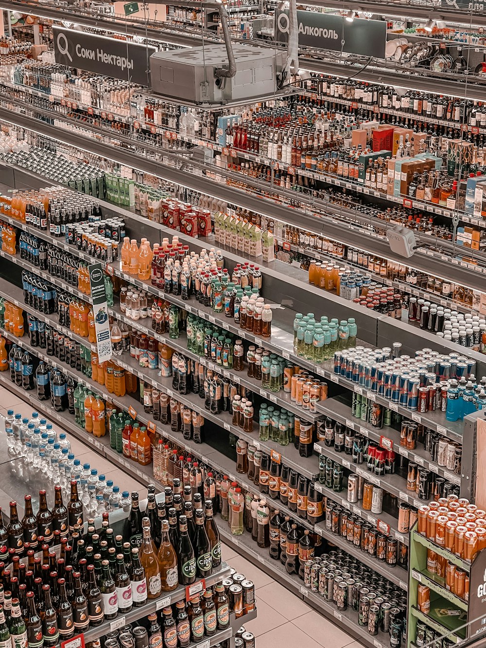 a grocery store filled with lots of bottles of beer