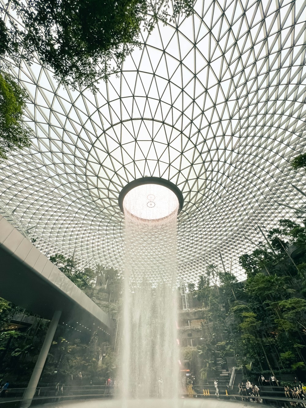 the inside of a building with a fountain