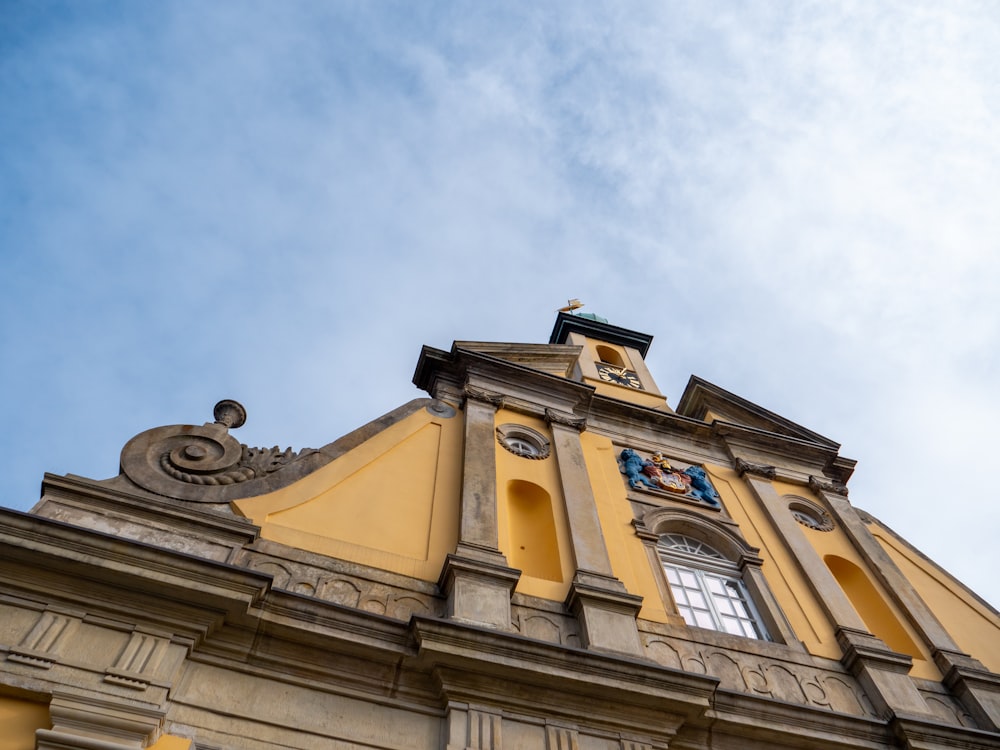 a tall building with a clock on the top of it