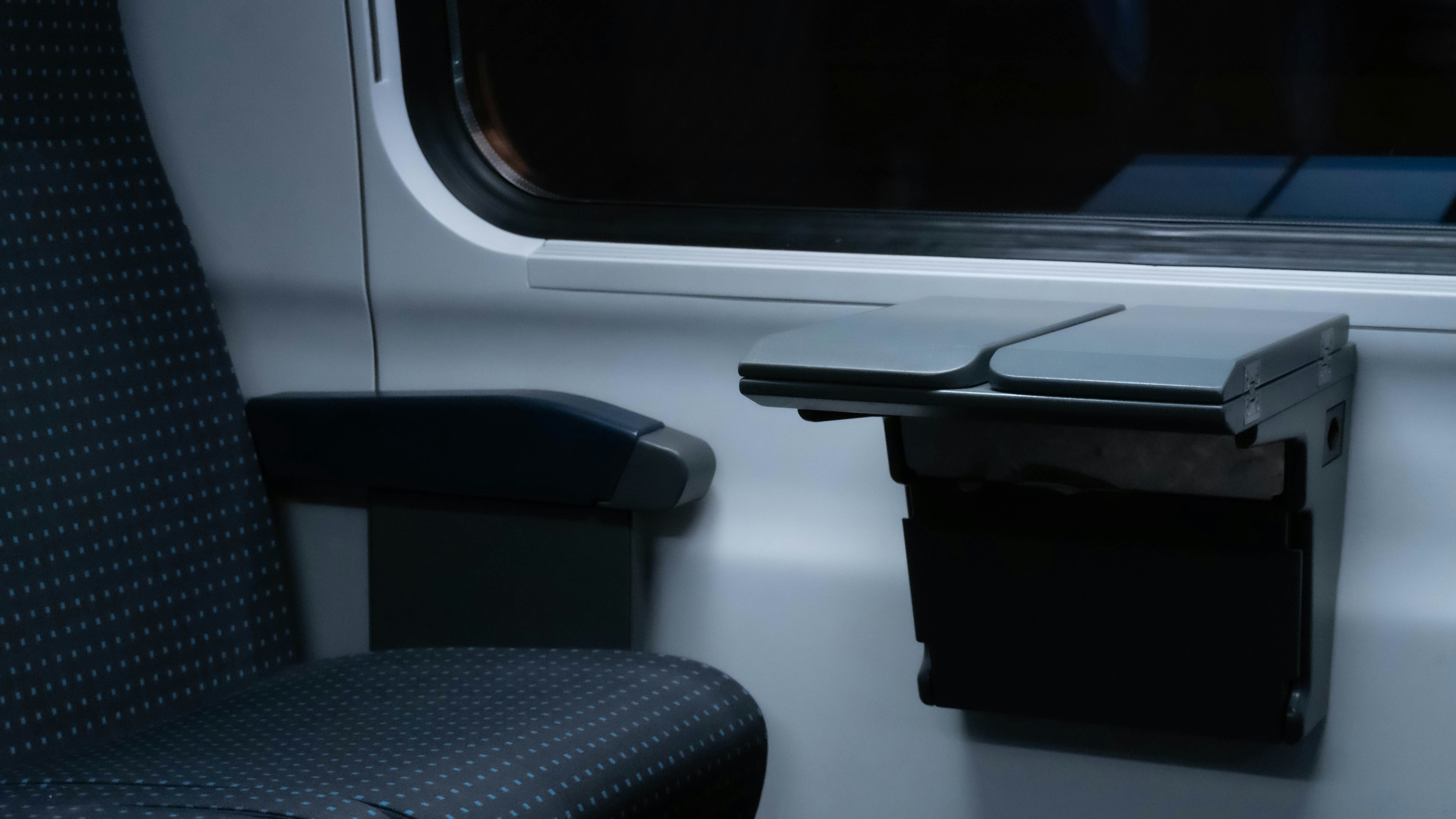 a chair and a table on a train