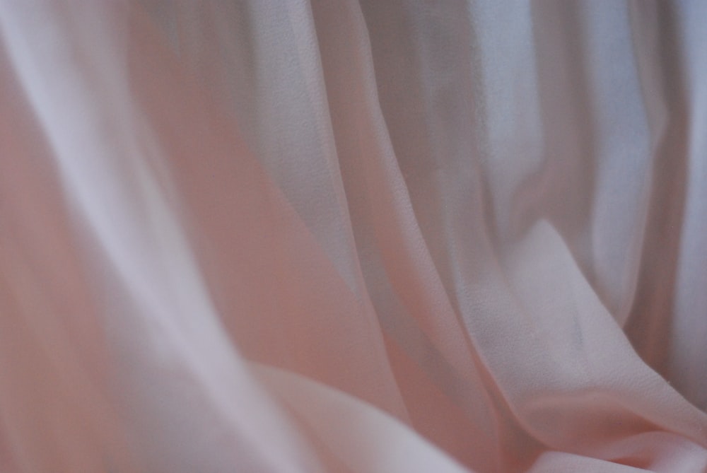 a close up view of a pink fabric